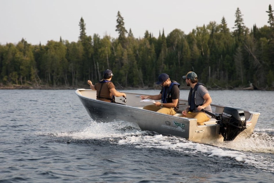 Three men in a fishing boat