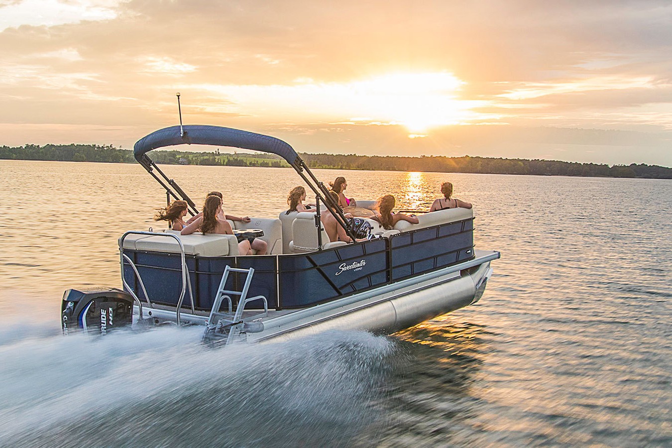 Family on a pontoon boat